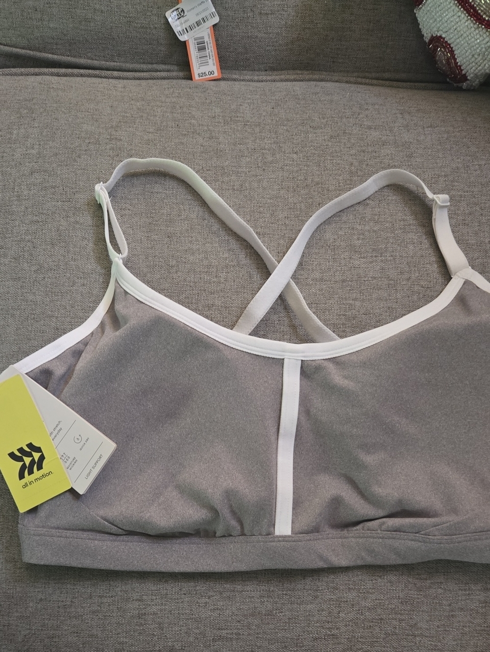 All in Motion brand sports bra with adjustable criss- cross